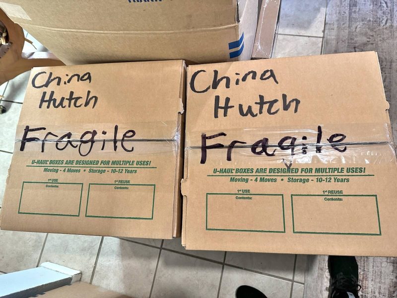 Labeled and Packed Fragile Moving Boxes