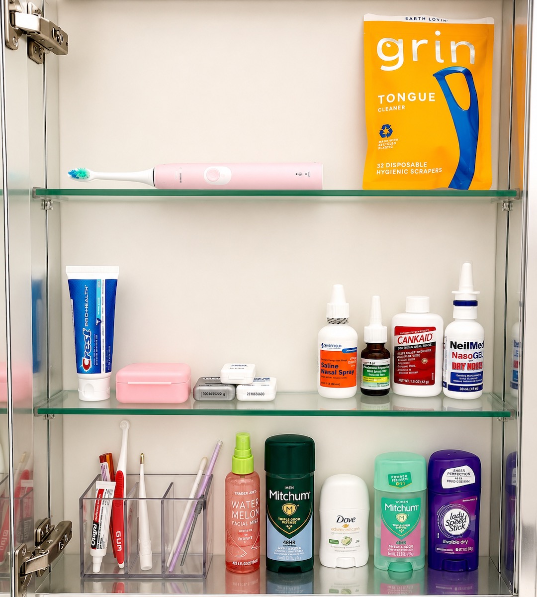 Organized medicine cabinet with glass shelves by Nola Organizers in New Orleans