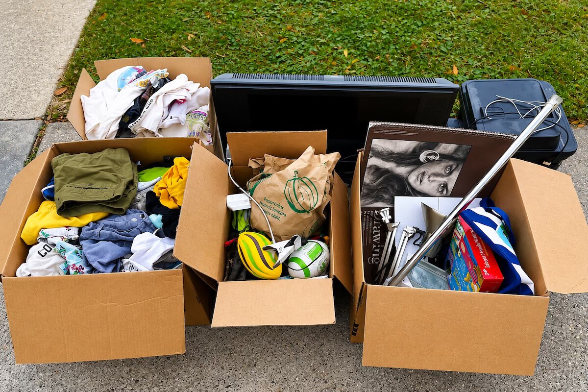 Items sorted into boxes during a Metairie home office decluttering project