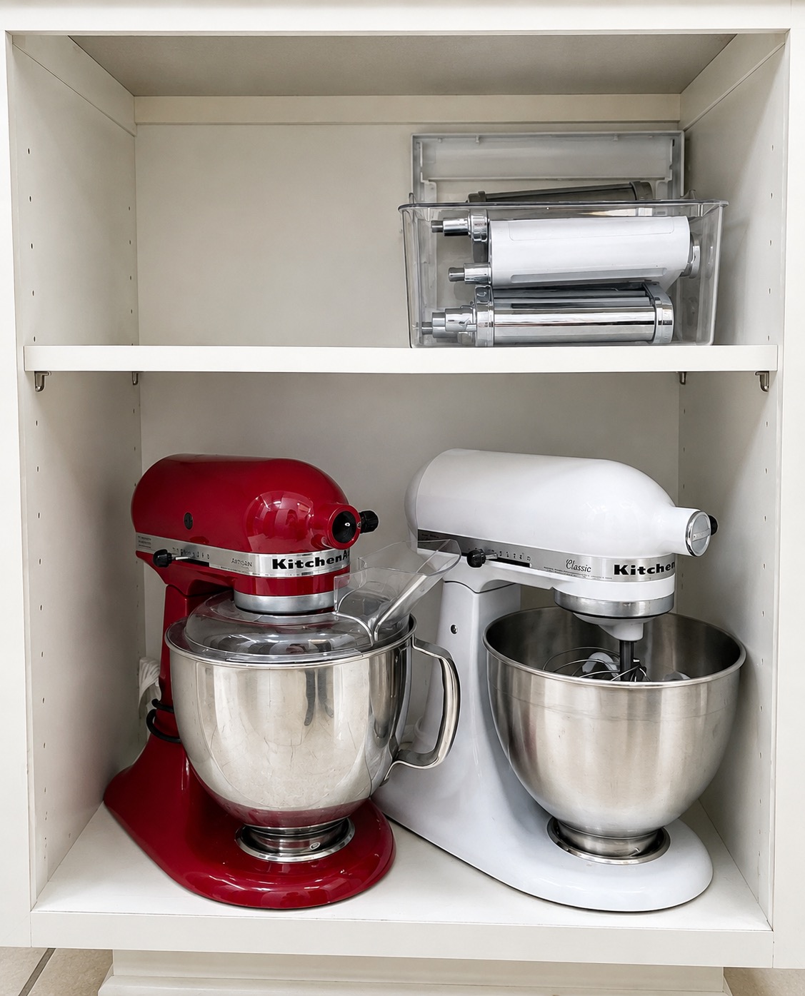 Mixer and small appliances placed together in a kitchen cabinet