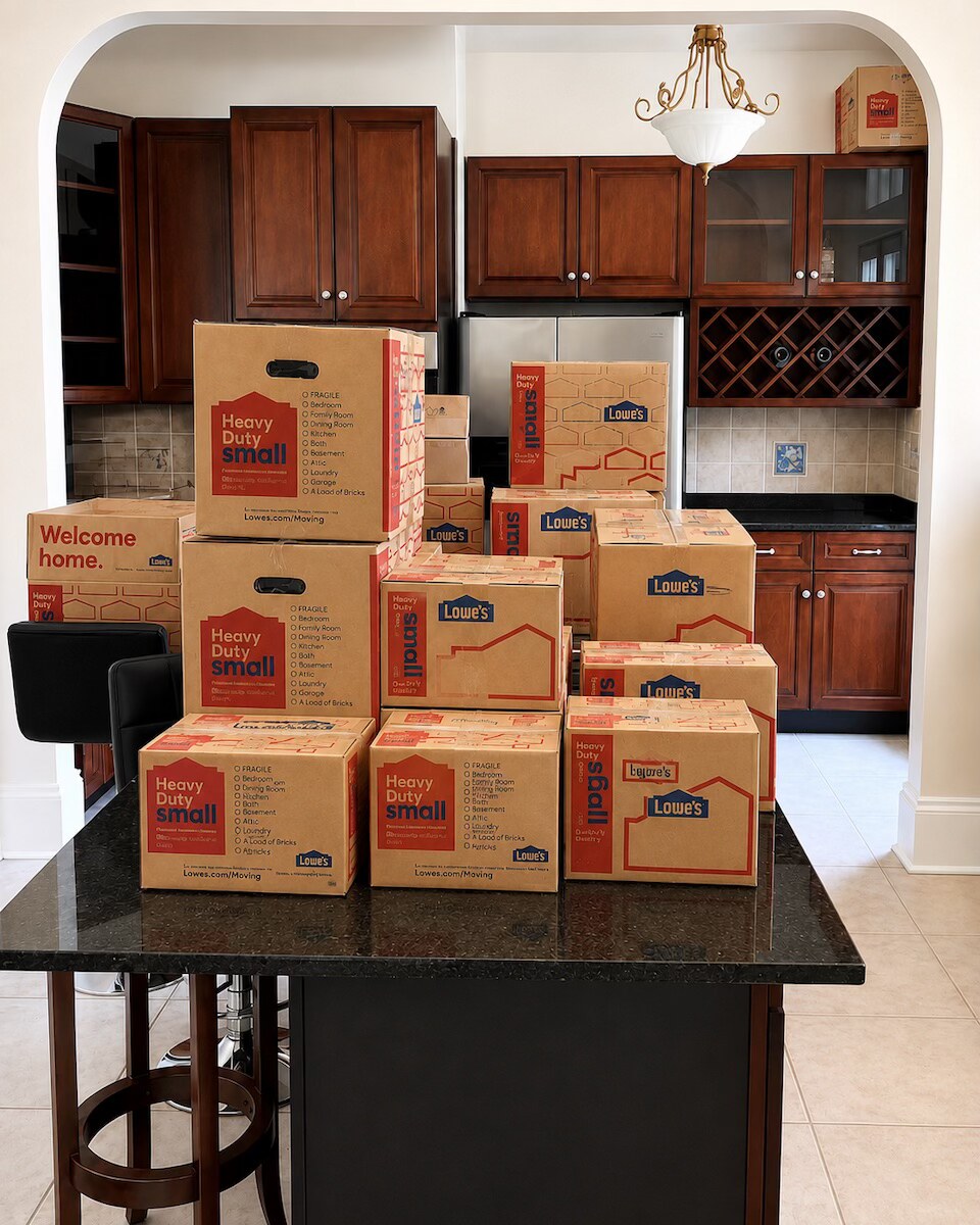 Kitchen boxes packed and organized for a New Orleans move