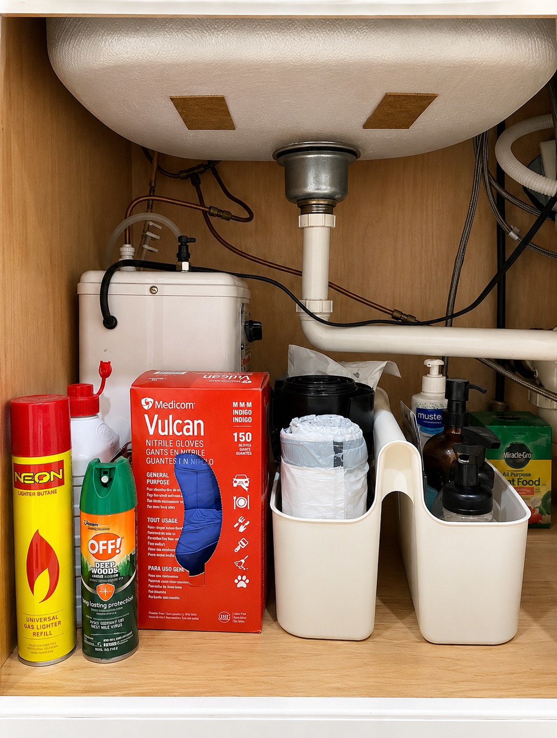 Second organized under-sink kitchen cabinet after the project