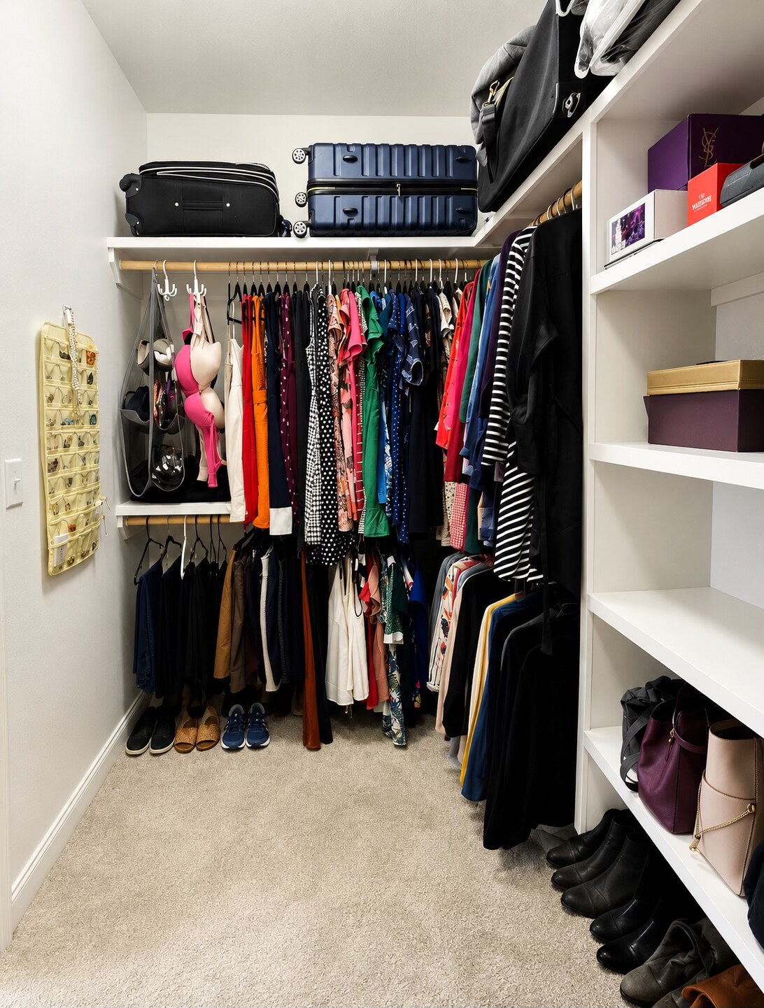 Organized walk-in closet after a Nola Organizers project in New Orleans