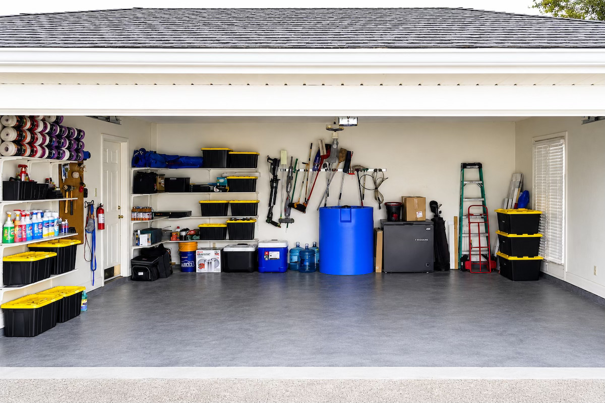 Professionally organized garage with clear zones and labeled storage in Baton Rouge by Nola Organizers