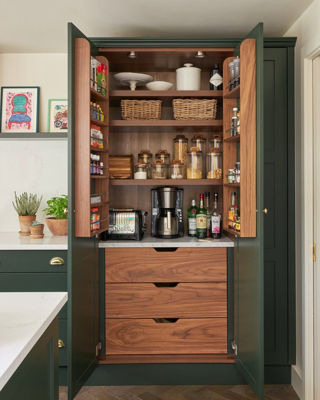 Professionally organized kitchen cabinets and drawers in New Orleans by Nola Organizers