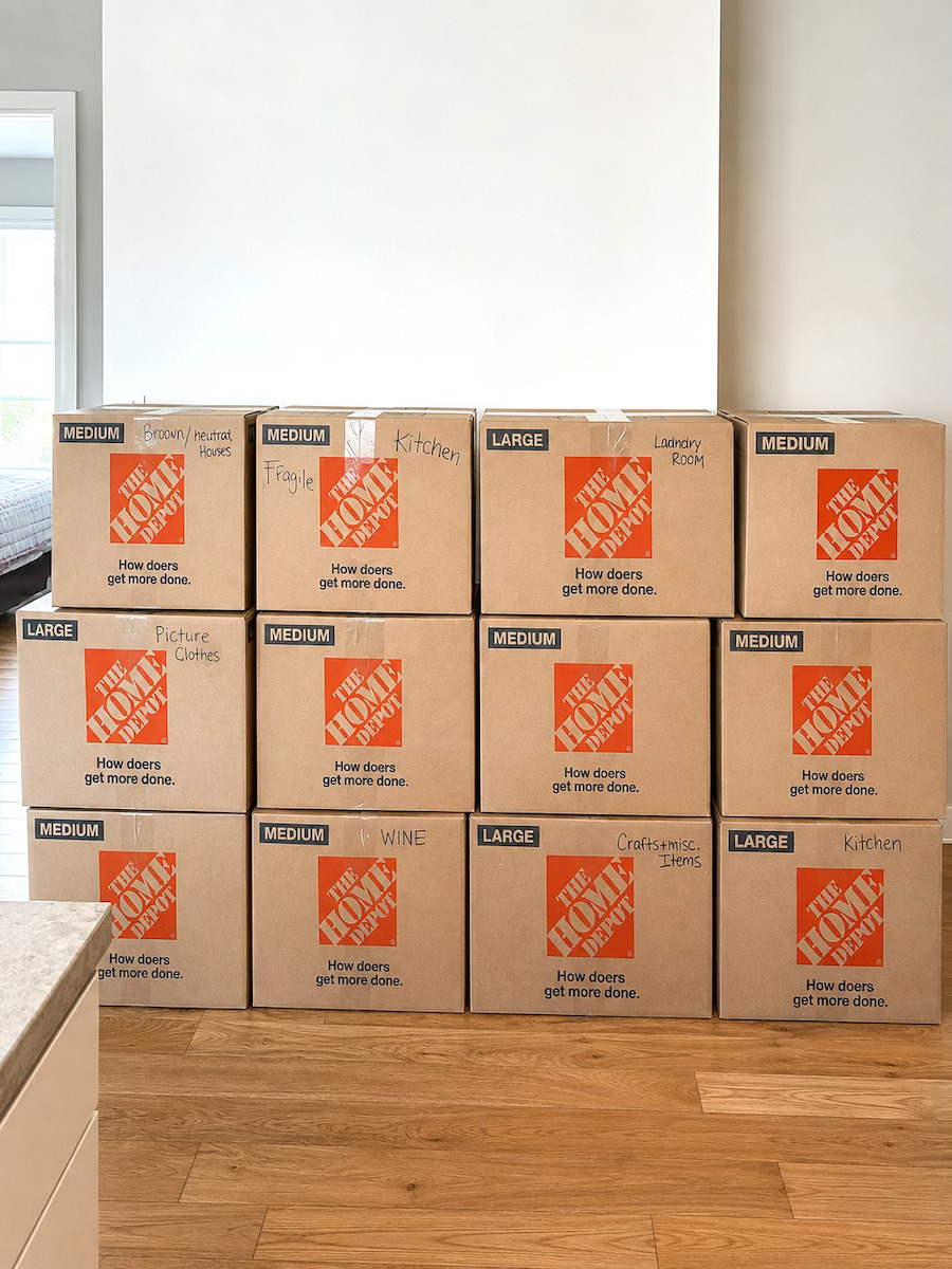 Labeled and stacked moving boxes packed by Nola Organizers in New Orleans