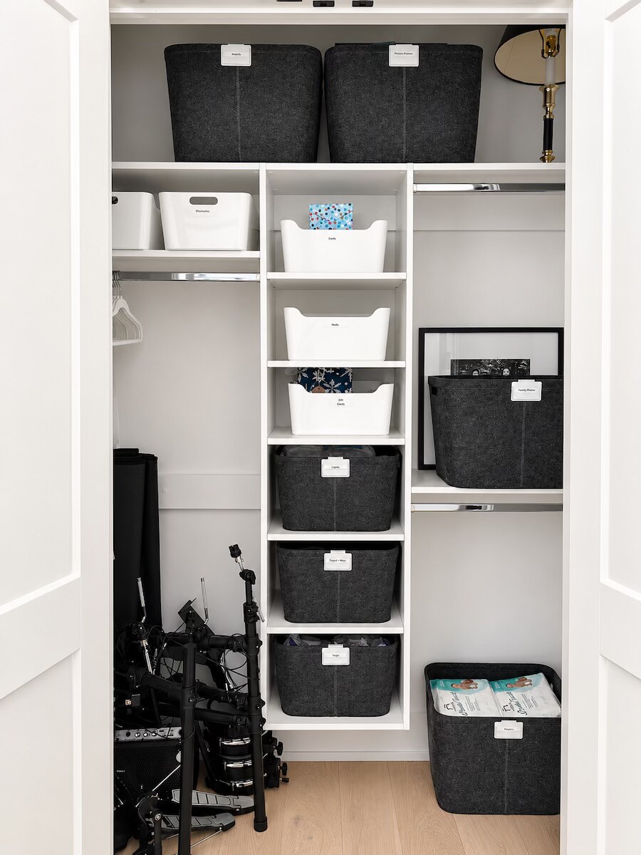 Organized office storage closet with labeled bins in New Orleans by Nola Organizers