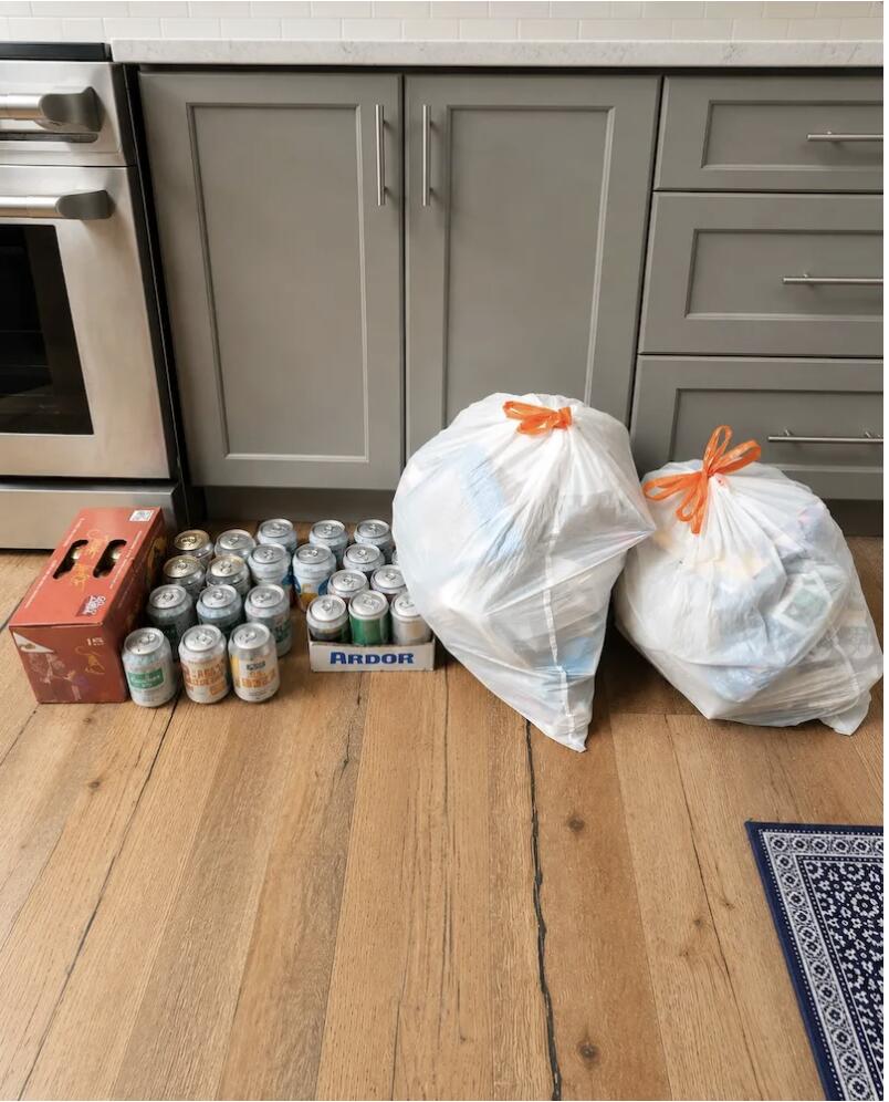 Expired food and items removed from pantry during Nola Organizers session