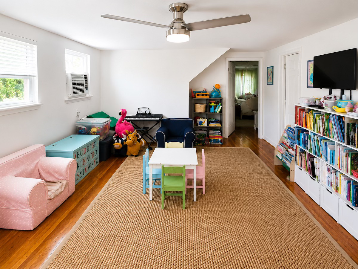 Organized playroom with labeled bins and sorted toys in New Orleans by Nola Organizers