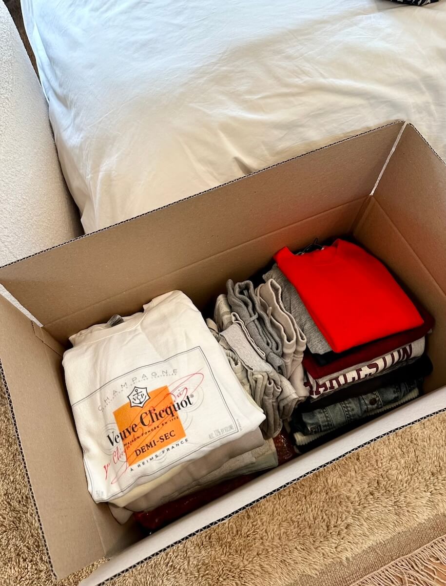 Clothes Packed in a Moving Box