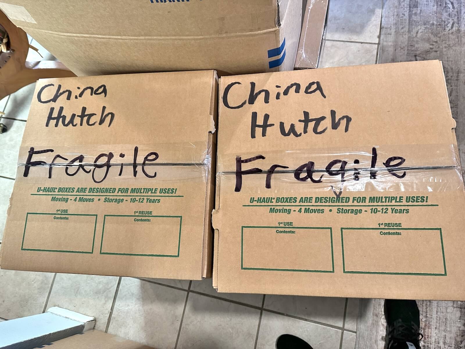 Labeled and Packed Fragile Moving Boxes