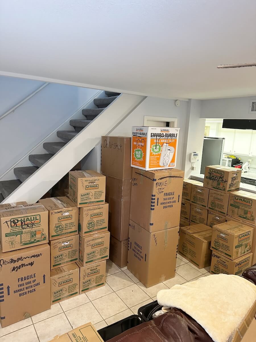 Packed Boxes Stacked Ready for Moving