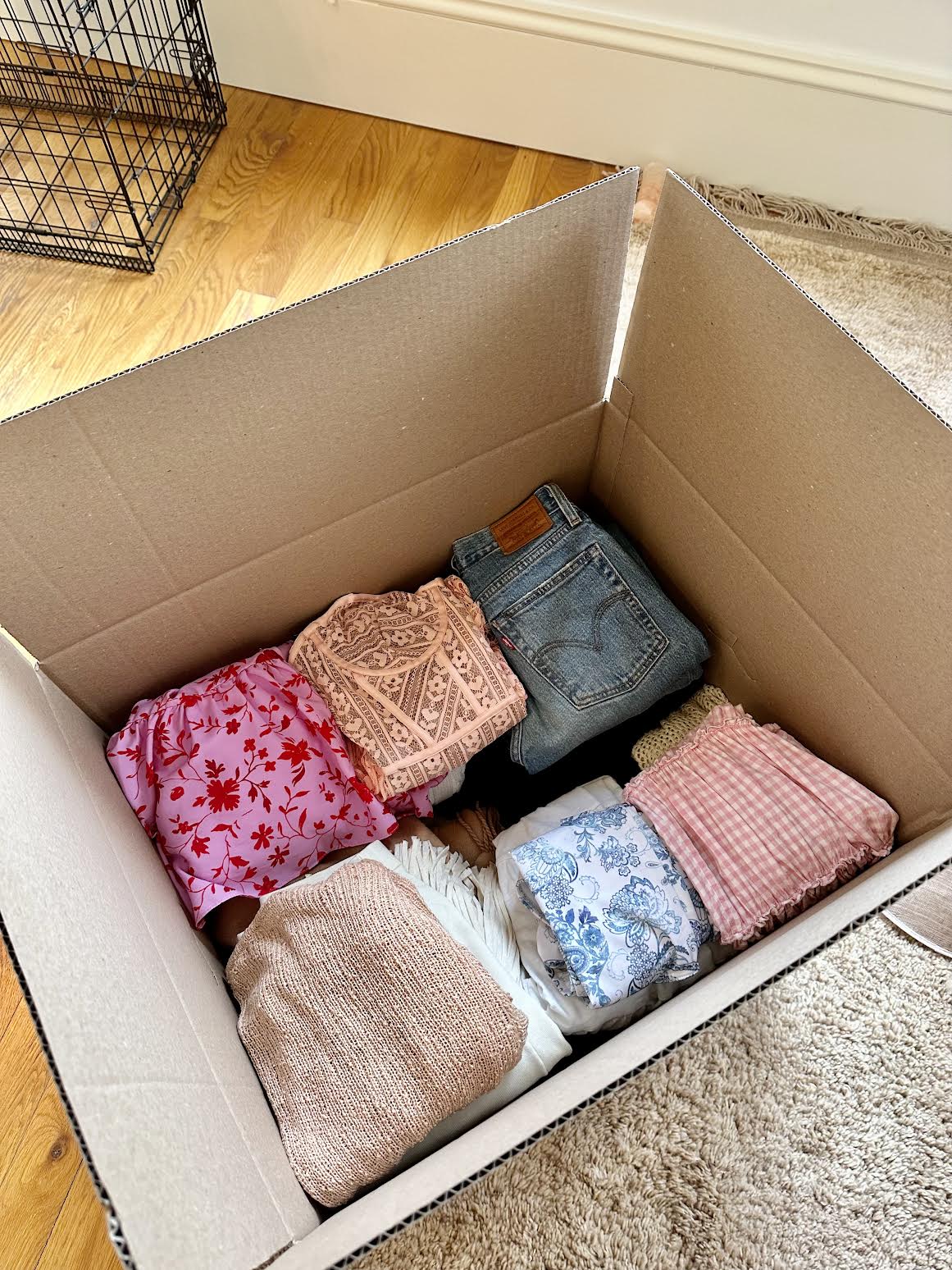 packing clothes in moving boxes copy 2